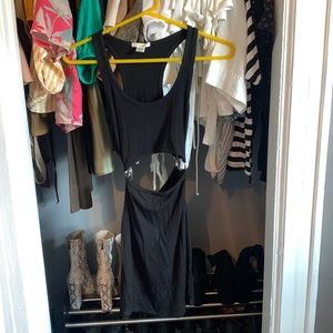 Black Mini Dress with silver ring decoration.